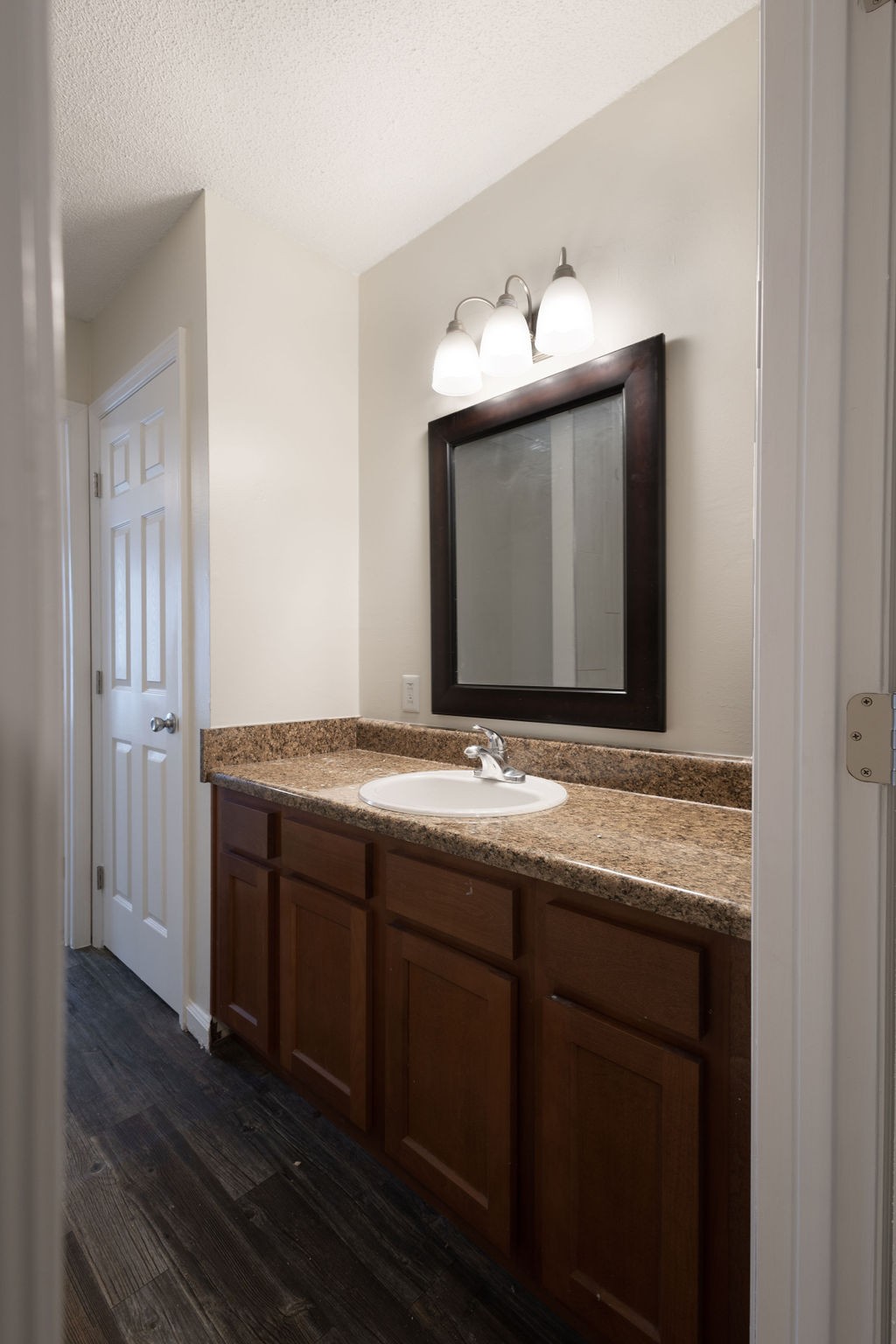 616 Castlegate Drive Nashville, TN 37217 - Photo 13 of 19 a bathroom with a granite countertop sink and a mirror