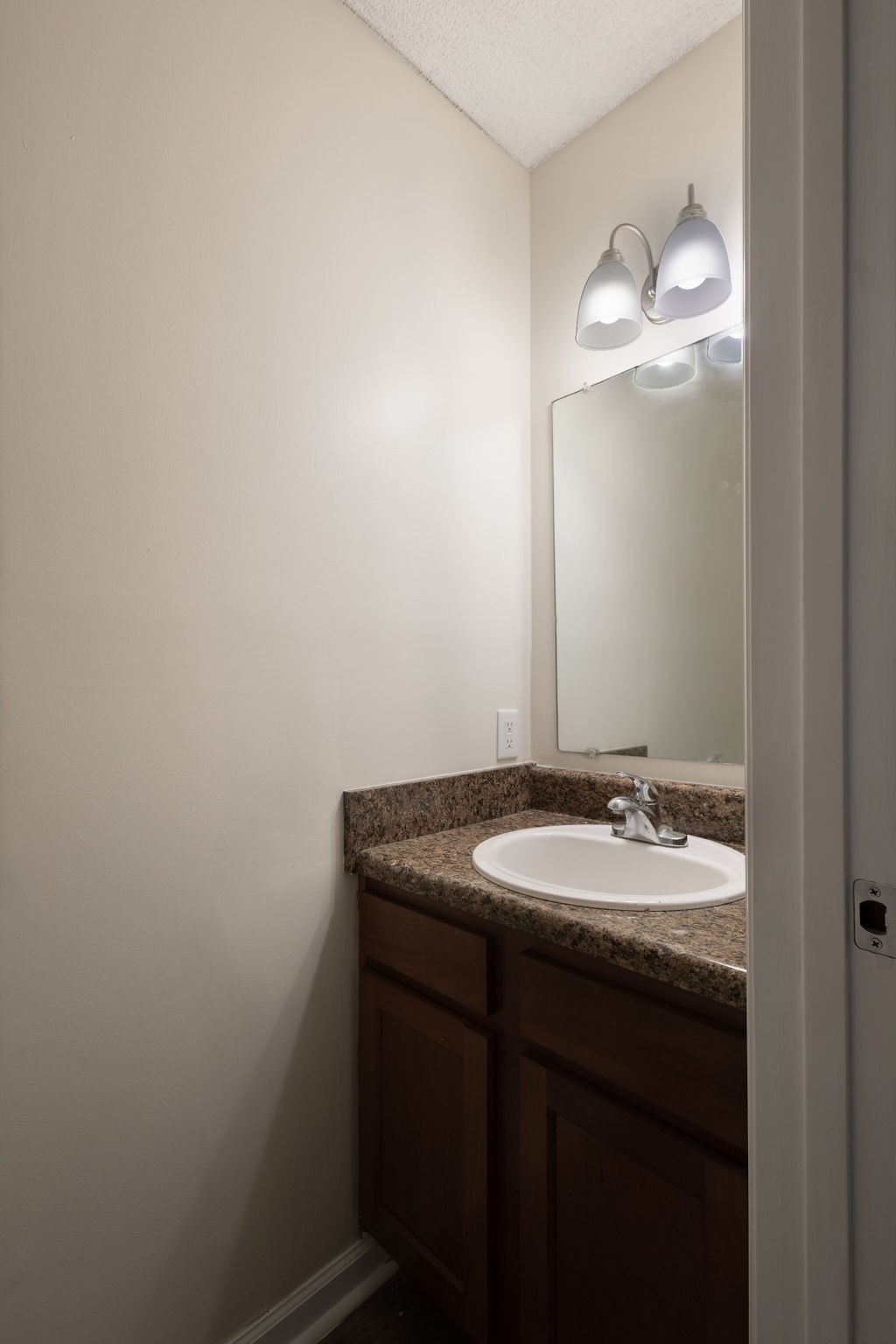 616 Castlegate Drive Nashville, TN 37217 - Photo 15 of 19 a bathroom with a granite countertop sink and a mirror