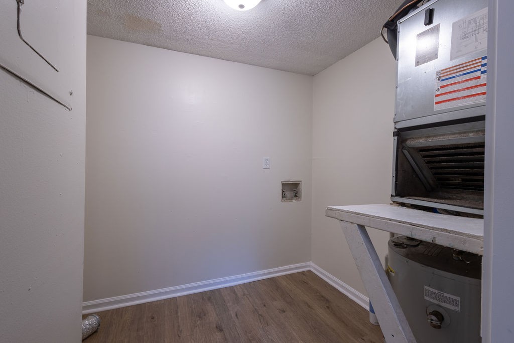 616 Castlegate Drive Nashville, TN 37217 - Photo 18 of 19 a view of a kitchen with wooden floor and electronic appliances
