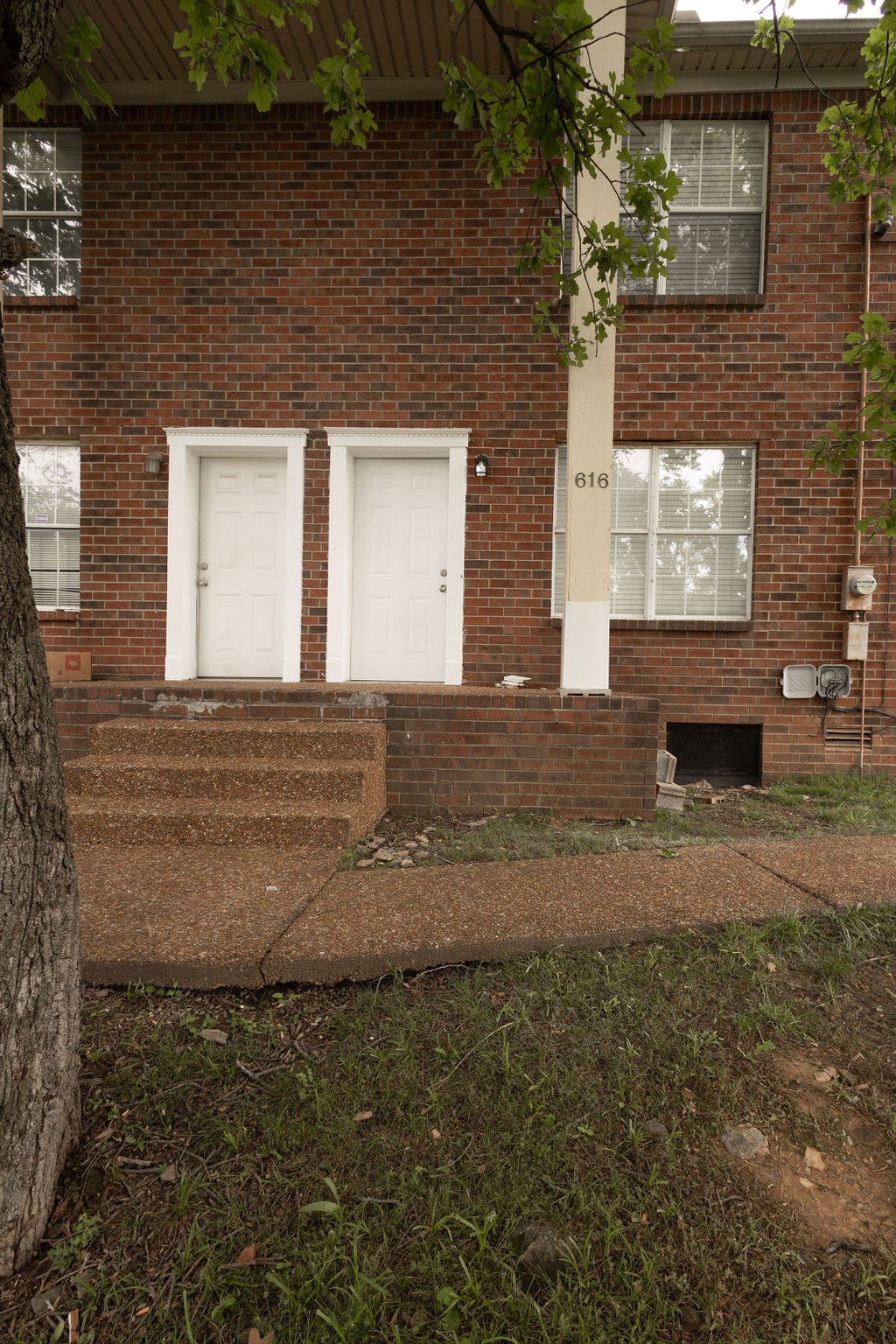 616 Castlegate Drive Nashville, TN 37217 - Photo 3 of 19 a front view of a house with a yard