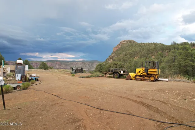a view of car parked on the roadside