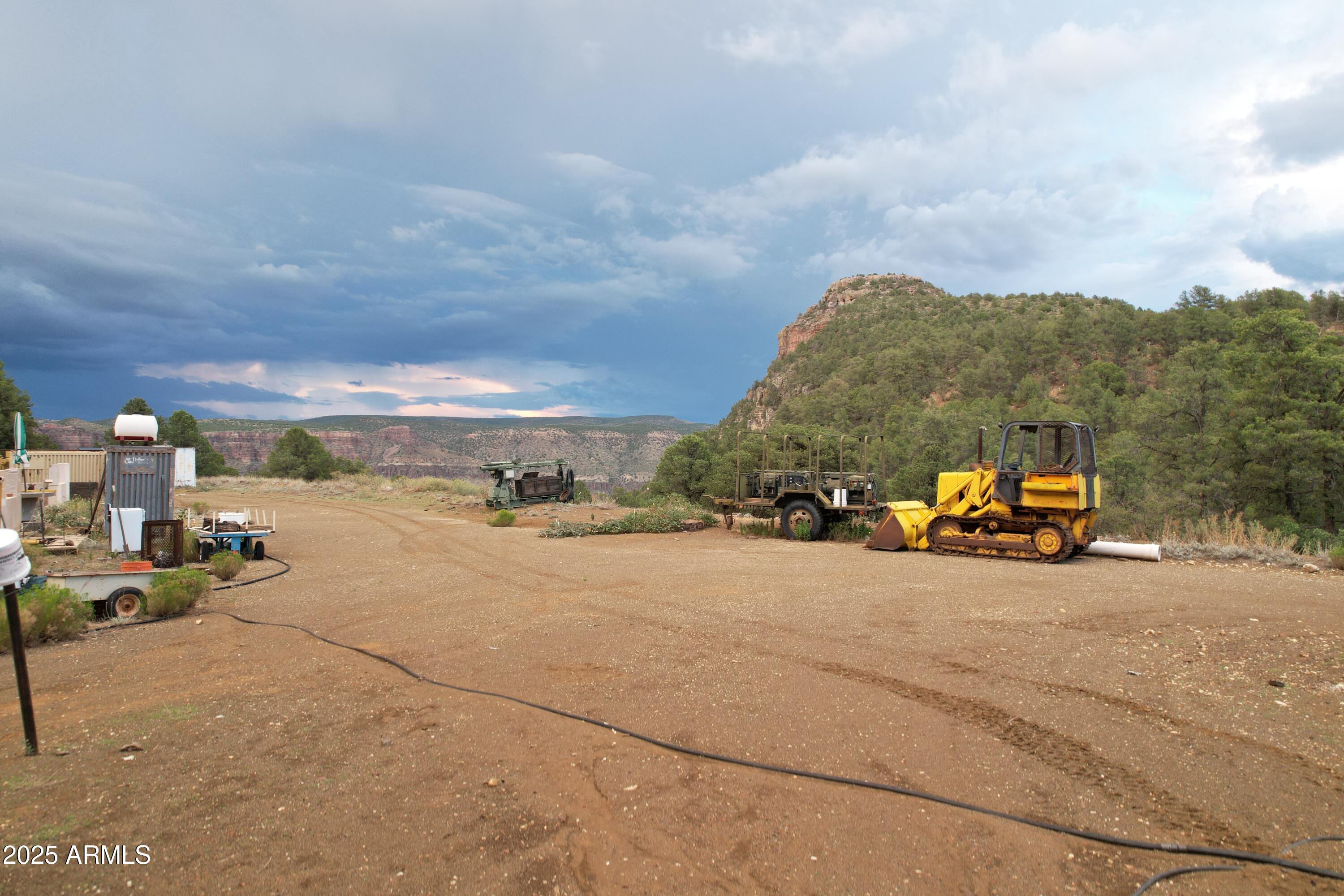 a view of car parked on the roadside