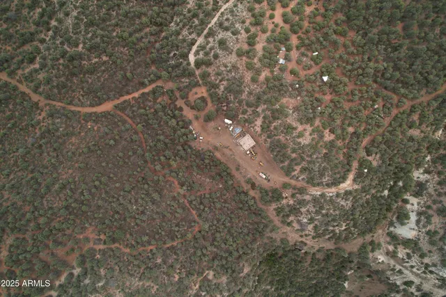 a view of a backyard of the house