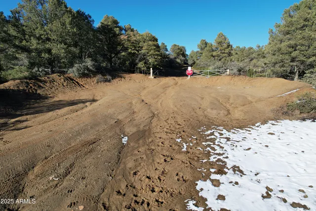 a view of a snow on the road