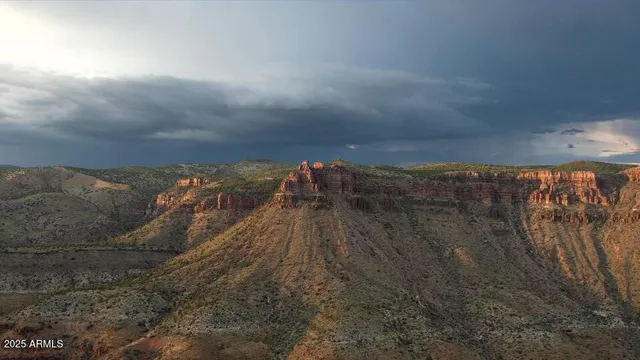 a view of a houses with a yard