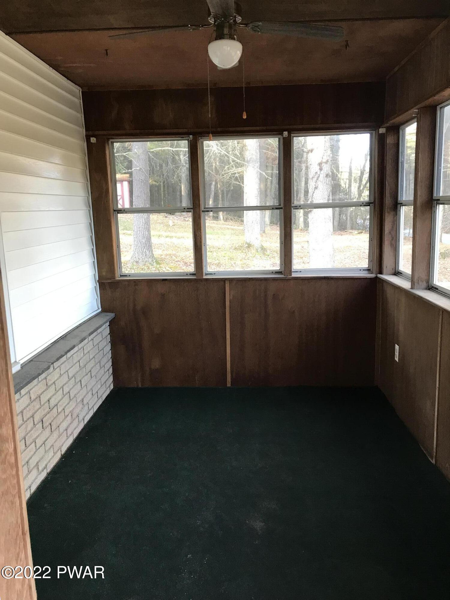 122 Greeley Lake Road Greeley, PA 18425 - Photo 5 of 24 Enclosed Porch