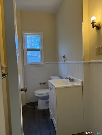 a bathroom with a sink and toilet