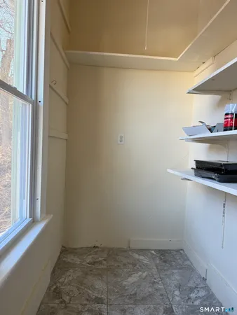 a room that has a lot of cabinets in it