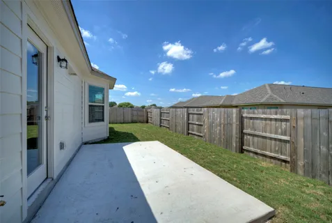 a view of a backyard with a garden