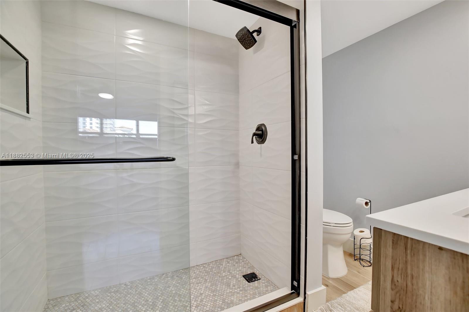 520 Orton Avenue, Unit 303 Fort Lauderdale, FL 33304 - Photo 11 of 20 a bathroom with a shower