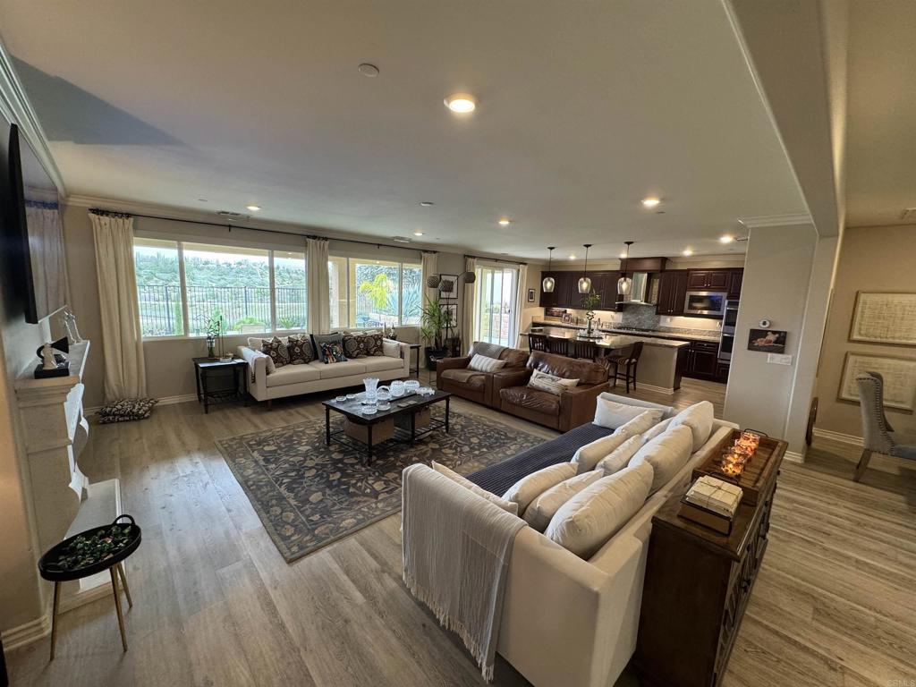 33792 Baystone Street Temecula, CA 92592 - Photo 15 of 21 a living room with furniture and a flat screen tv