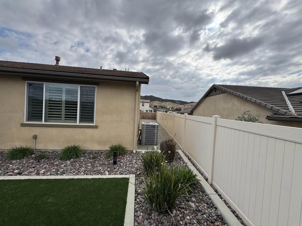 33792 Baystone Street Temecula, CA 92592 - Photo 5 of 21 a house view with a garden space