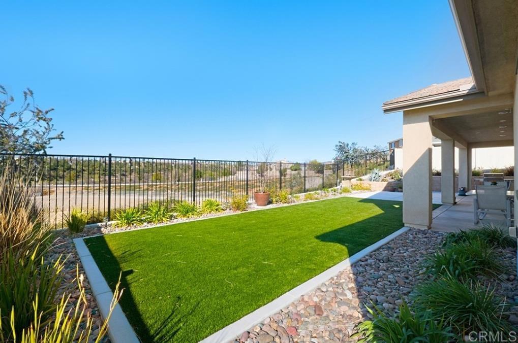 33792 Baystone Street Temecula, CA 92592 - Photo 6 of 21 a view of a backyard with a garden and plants