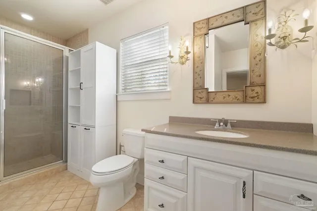 a bathroom with a toilet and a sink