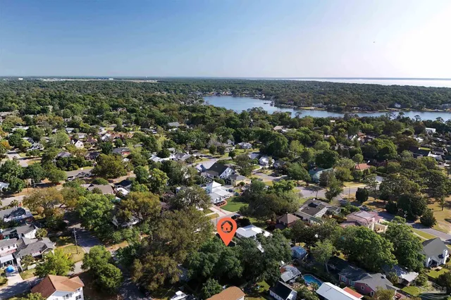 a picture of a bathroom with a shower