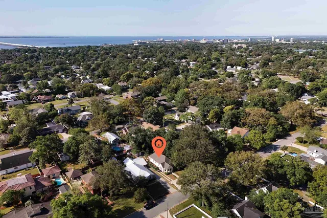 a picture of a bathroom with a shower