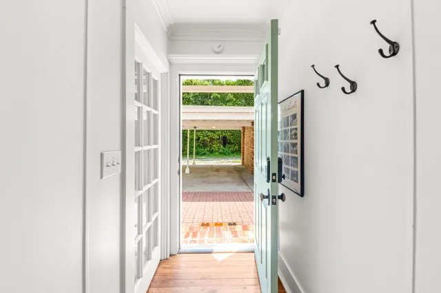 a spacious bathroom with a double vanity sink and a mirror