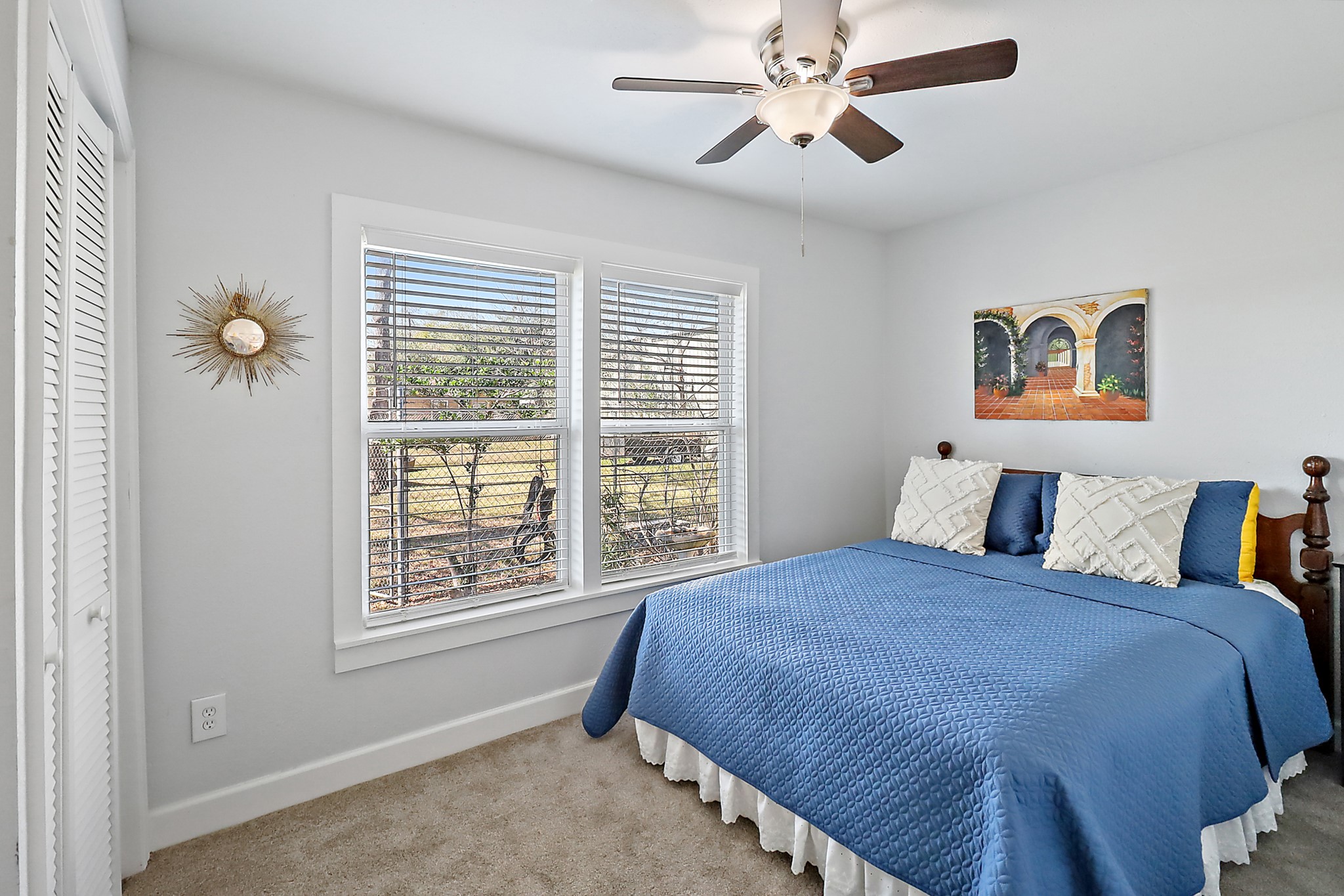 7317 Longview Street Houston, TX 77020 - Photo 18 of 30 a bedroom with a bed next to a window
