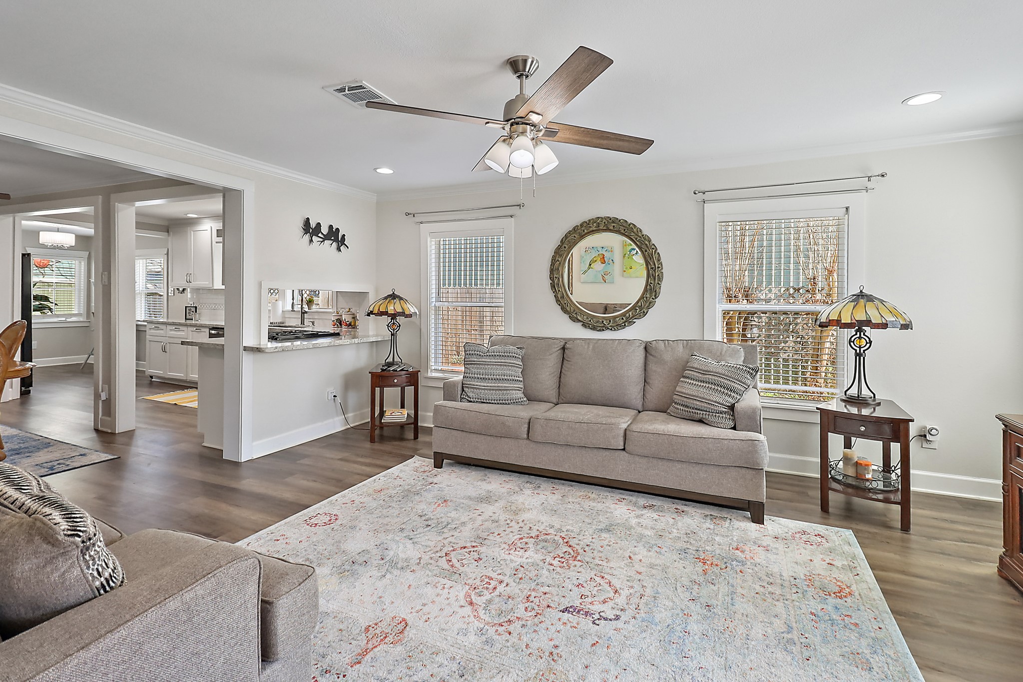 7317 Longview Street Houston, TX 77020 - Photo 6 of 30 a living room with furniture and a clock
