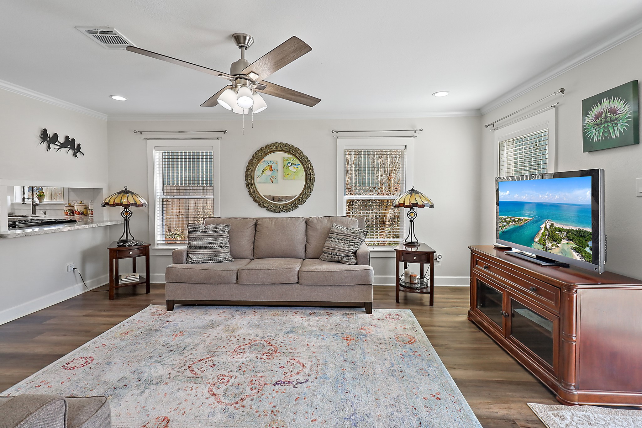 7317 Longview Street Houston, TX 77020 - Photo 7 of 30 a living room with furniture and a clock