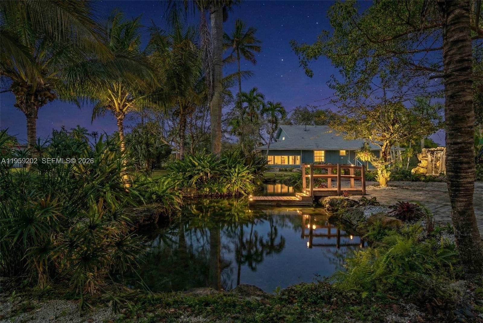 19820 Southwest 244th Street Homestead, FL 33031 - Photo 11 of 52 AN EVENING VIEW LOOKING BACK AT HOUSE