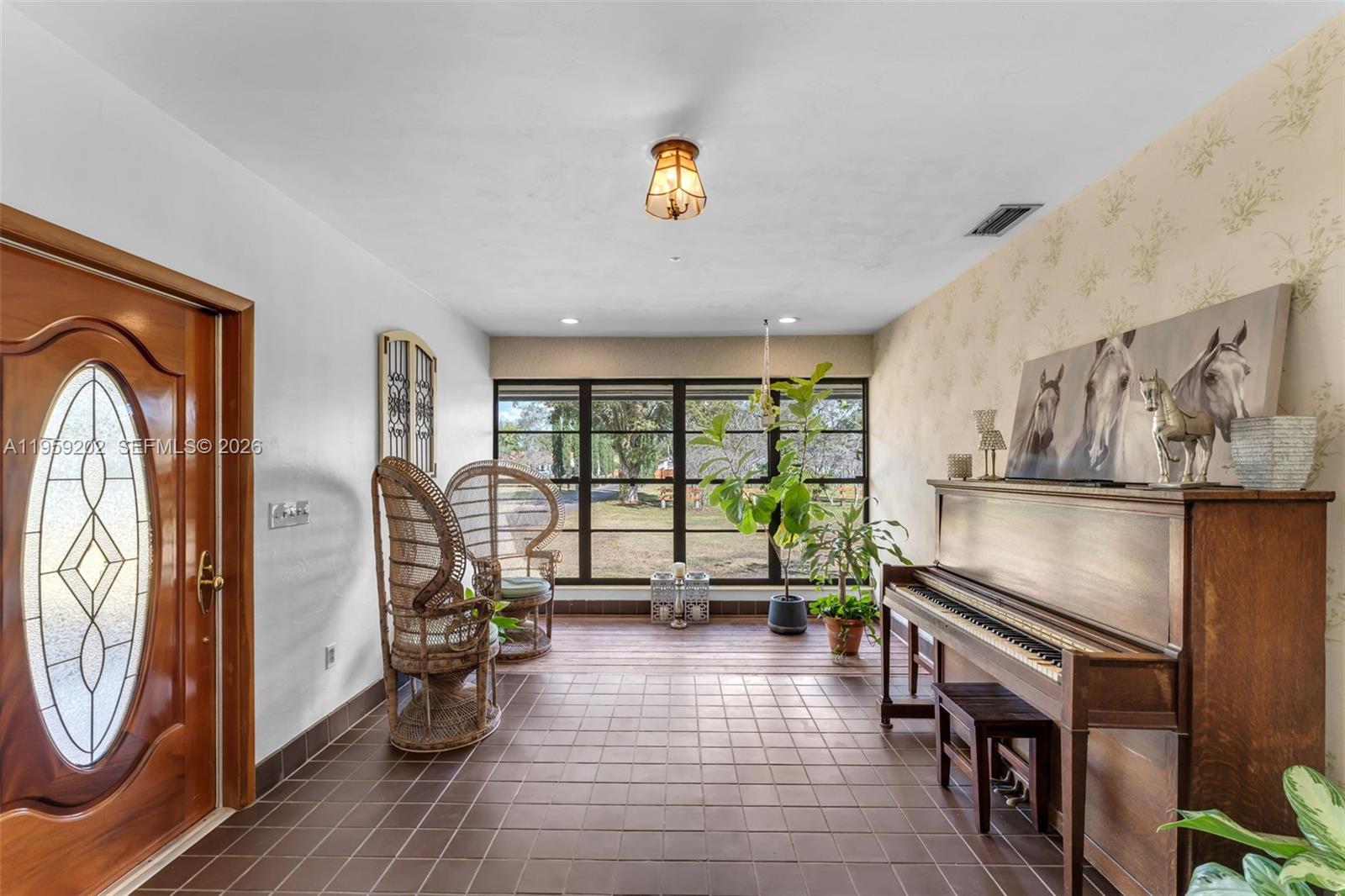 19820 Southwest 244th Street Homestead, FL 33031 - Photo 17 of 52 FOYER ENTRY INTO THE HOME