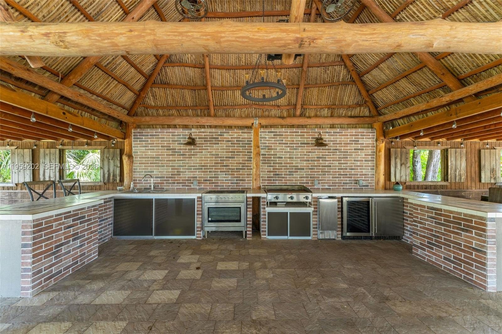 19820 Southwest 244th Street Homestead, FL 33031 - Photo 33 of 52 LARGE KITCHEN IN PAVILLION