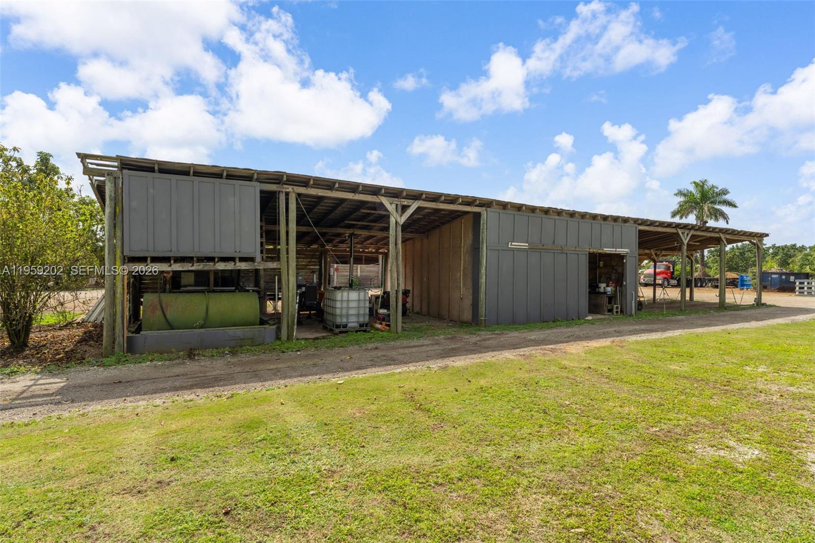 19820 Southwest 244th Street Homestead, FL 33031 - Photo 47 of 52 OUTBUILDING.. THE ORIGINAL SHOP HOLDS A BIG PERKINS DIESEL (2018) 50hp