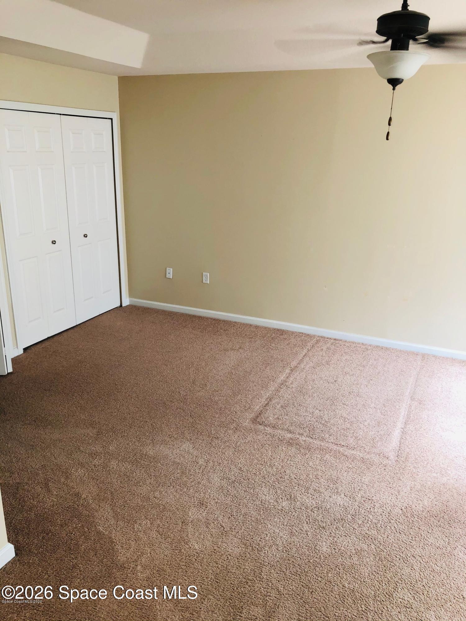 1280 Luminary Circle, Unit 103 Melbourne, FL 32901 - Photo 7 of 14 a view of an empty room