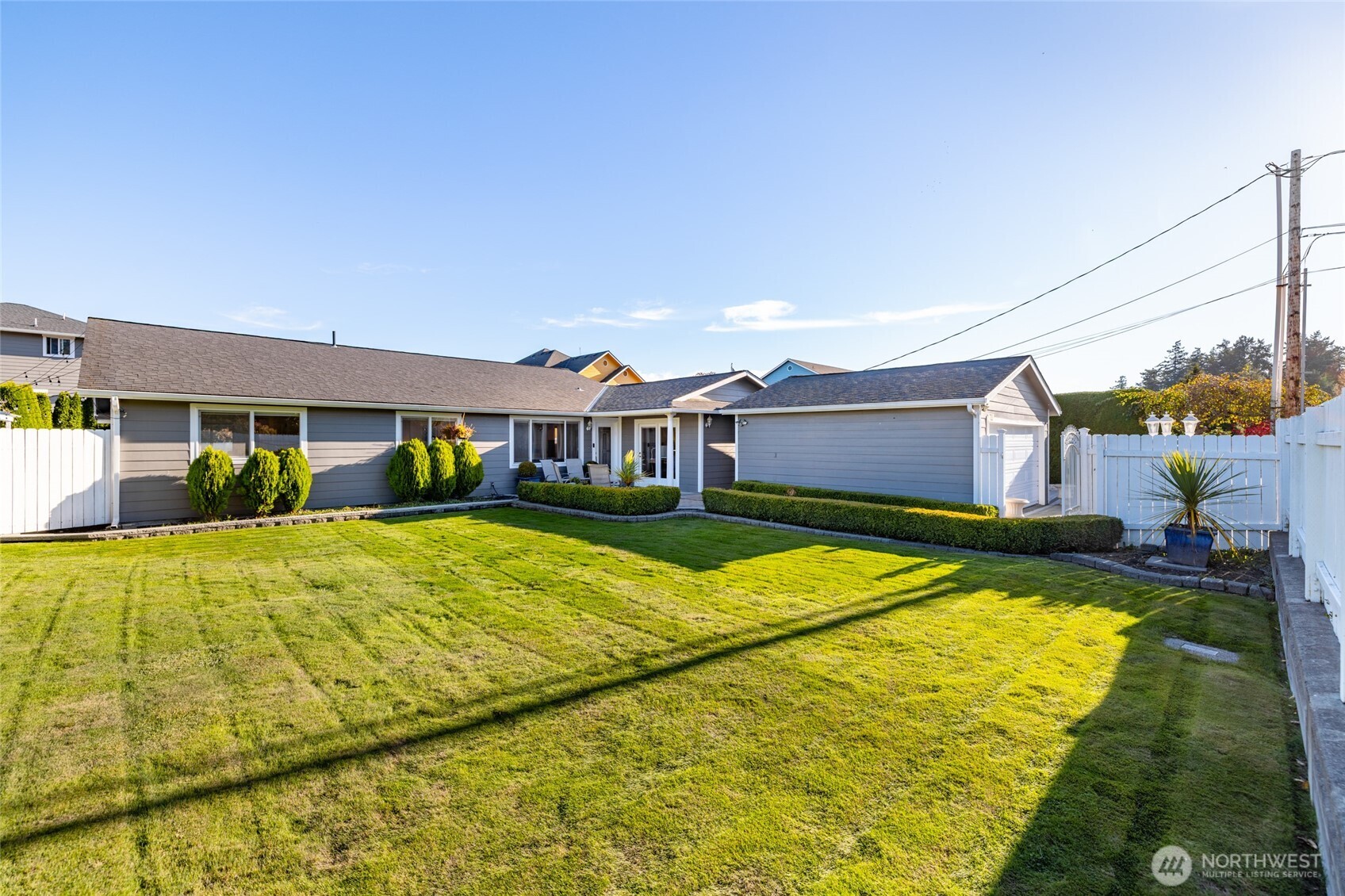733 Maple Avenue La Conner, WA 98257 - Photo 2 of 39 a swimming pool with outdoor seating and yard