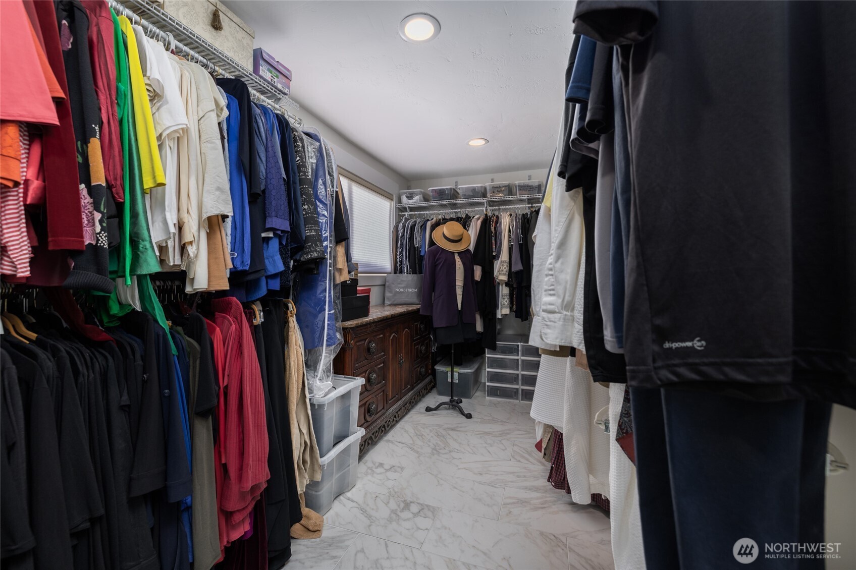733 Maple Avenue La Conner, WA 98257 - Photo 24 of 39 a view of walk in closet with clothes and shoes