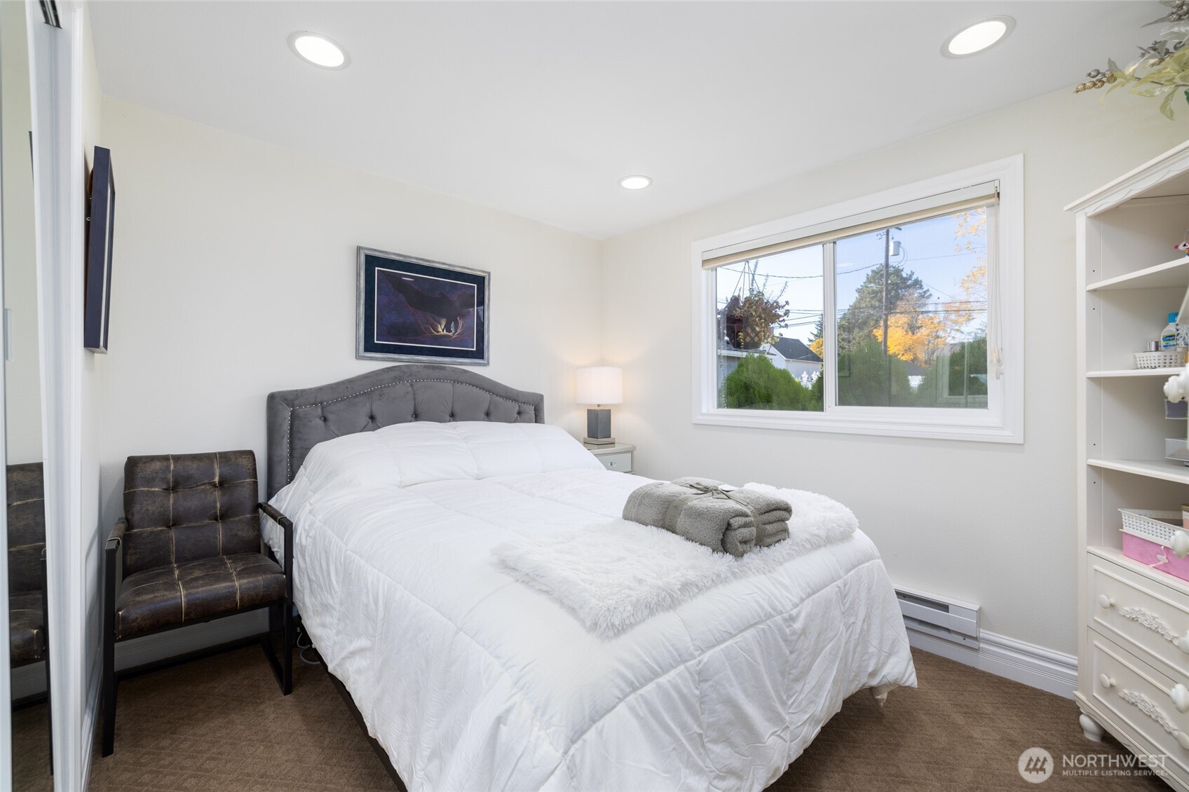 733 Maple Avenue La Conner, WA 98257 - Photo 25 of 39 a bedroom with a bed and a couch