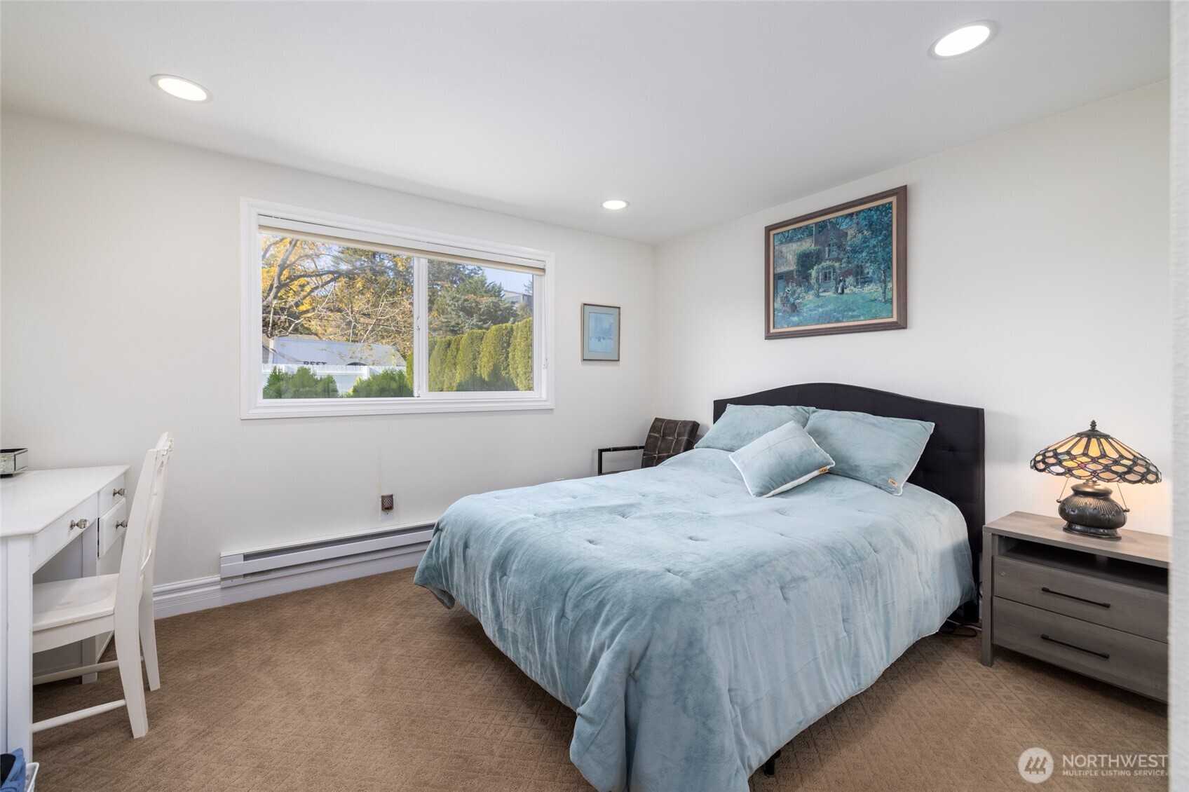 733 Maple Avenue La Conner, WA 98257 - Photo 26 of 39 a bedroom with a bed and a window