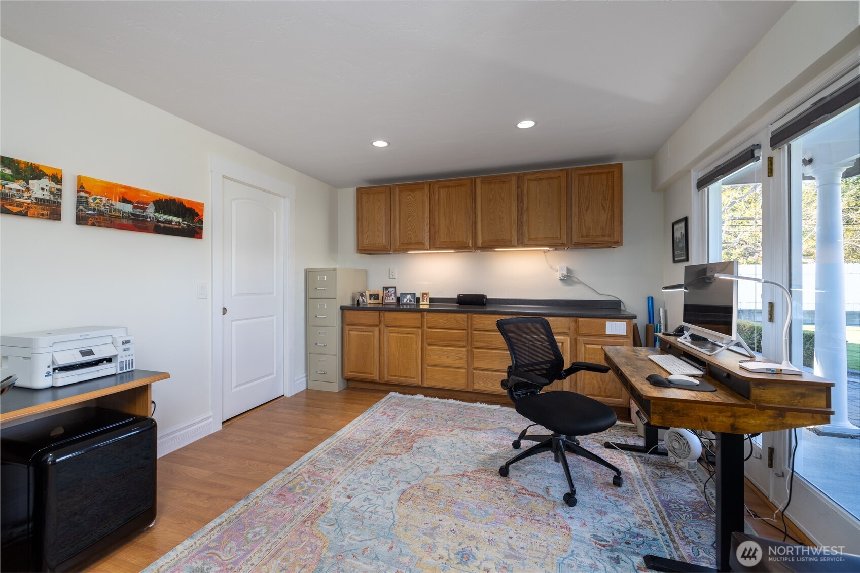 733 Maple Avenue La Conner, WA 98257 - Photo 27 of 39 a kitchen with granite countertop a stove a sink and a refrigerator