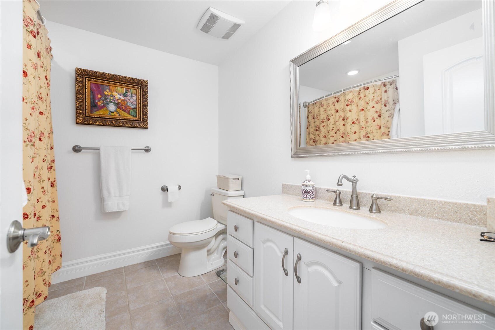 733 Maple Avenue La Conner, WA 98257 - Photo 29 of 39 a bathroom with a granite countertop toilet sink and mirror
