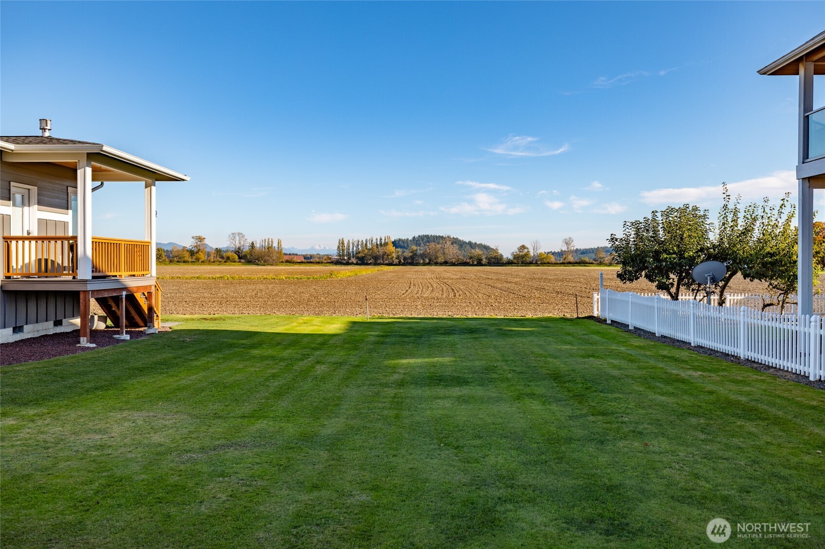 733 Maple Avenue La Conner, WA 98257 - Photo 33 of 39 a view of a lake with a big yard