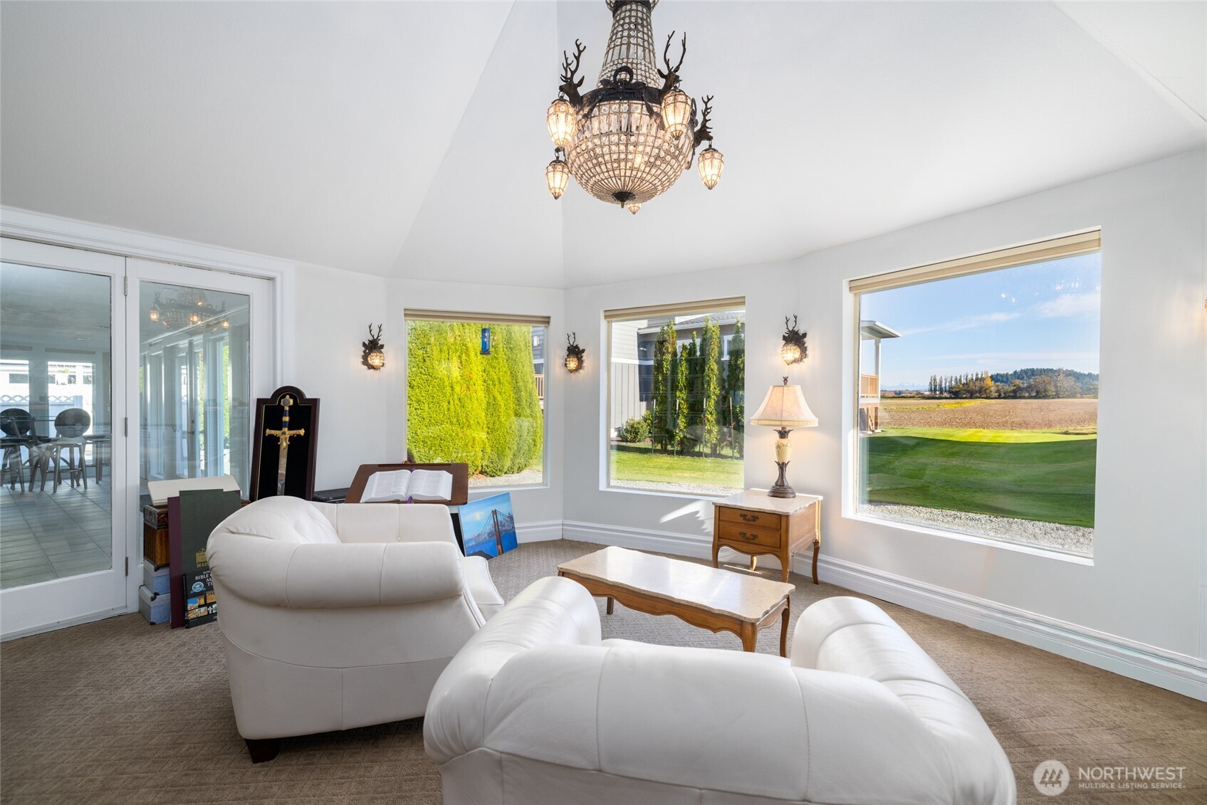 733 Maple Avenue La Conner, WA 98257 - Photo 8 of 39 a living room with furniture and a flat screen tv