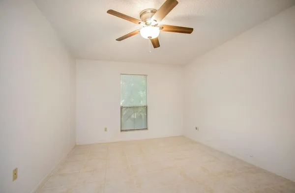 an empty room with a bathroom