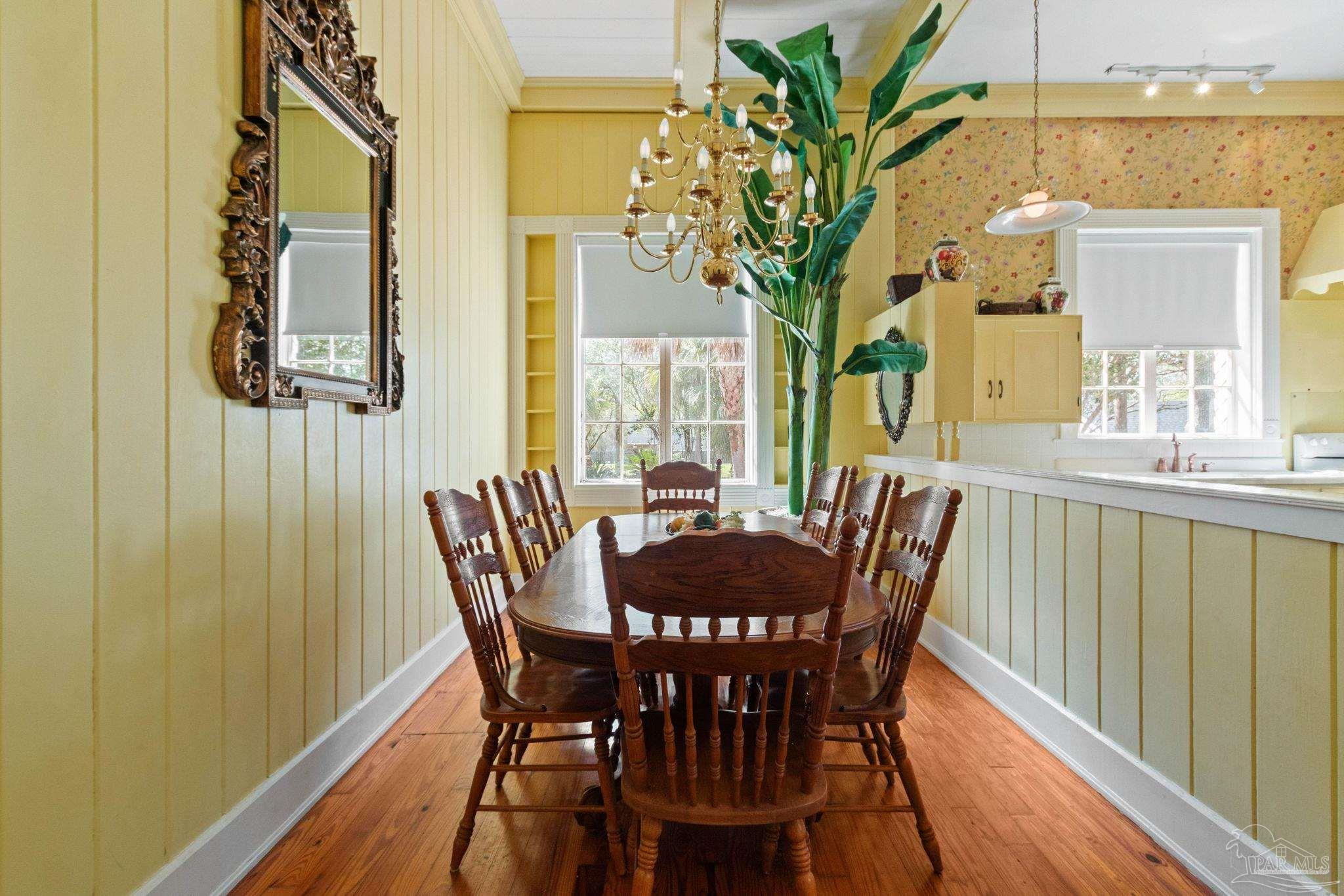 1701 Sowell Road Brewton, AL 36426 - Photo 45 of 72 a view of a dining room with furniture and wooden floor