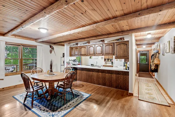 a open kitchen with stainless steel appliances granite countertop a stove and cabinets