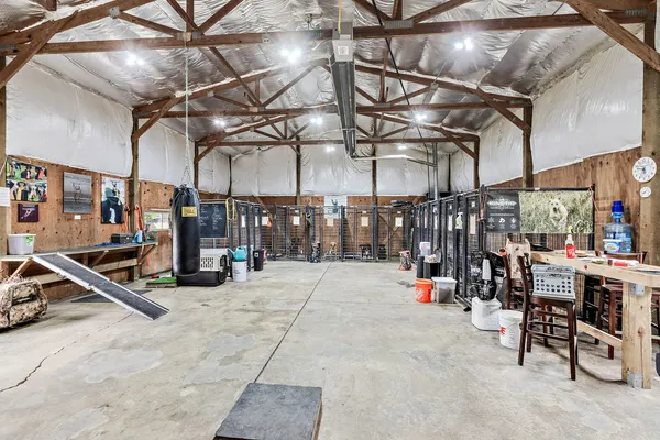 a view of a garage with a table and chairs