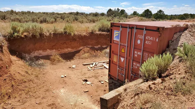 a view of a yard with an outdoor space