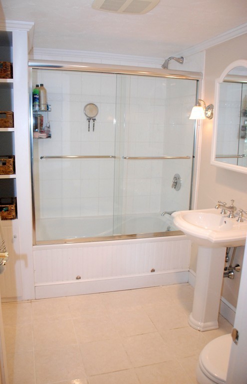 76 Stagecoach Road Duxbury, MA 02332 - Photo 14 of 26 a bathroom with a sink and a mirror