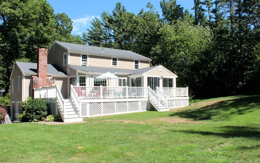 76 Stagecoach Road Duxbury, MA 02332 - Photo 2 of 26 a front view of a house with a yard