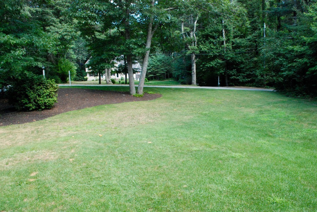 76 Stagecoach Road Duxbury, MA 02332 - Photo 26 of 26 a view of green field with trees in the background