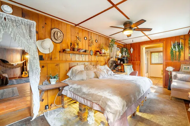 a bathroom with a sink a toilet and shower curtain