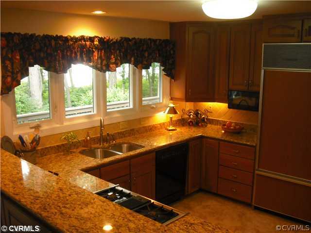 5806 Spinnaker Cove Road Midlothian, VA 23112 - Photo 6 of 12 Kitchen - Tavern Kitchen with Jennair Gast stove and Sub-Zero Refrigerator