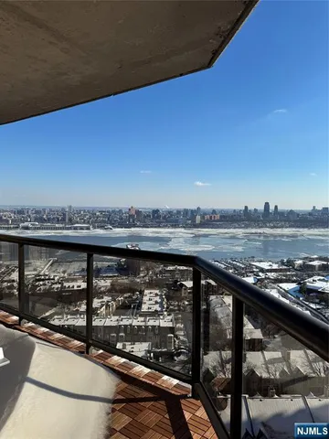 a view of a city and lake