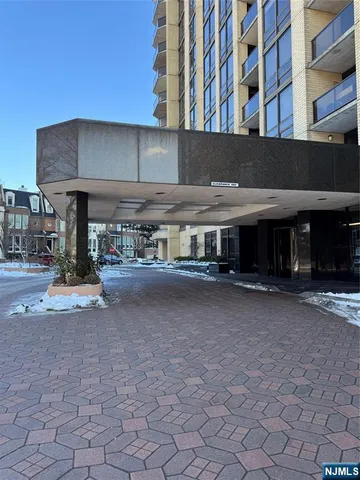a view of a street with cars