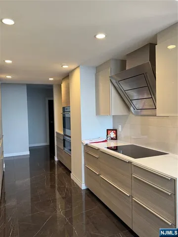 a room with furniture and a flat screen tv